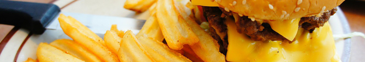 Eating Burger at Bravo Burgers restaurant in Pomona, CA.